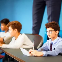 Kid at back of class