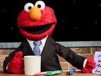 News-reporter Elmo 