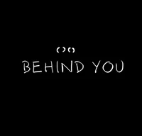 BEHIND YOU