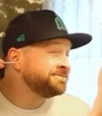 guy cleaning his ear