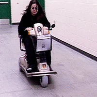 Ozzy on a scooter