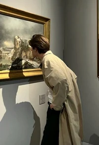 -man in art gallery-