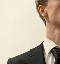 AARON WARNER
