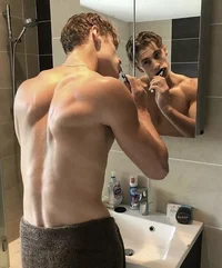 AARON WARNER