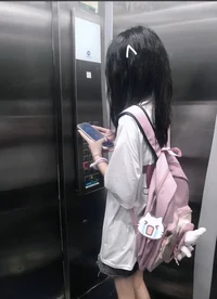 Girl in the Elevator