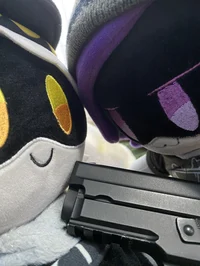 Raise an uzi plushie