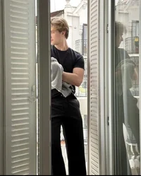 AARON WARNER