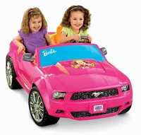 Kids in Barbie car 