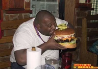 Guy eating burger