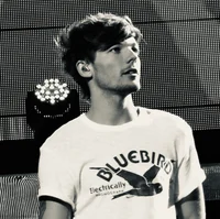 LOUIS TOMLINSON