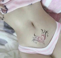 Magical womb tattoo