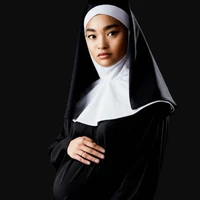 Pregnant Nun