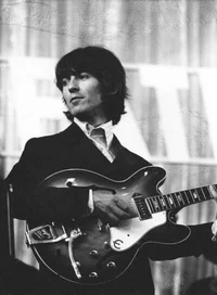T-B George Harrison