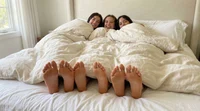 Girls at the bed