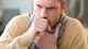 A coughing man