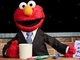 News-reporter Elmo 