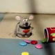 Rat eating chocolate