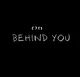 BEHIND YOU