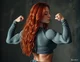 Redhead muscle girl
