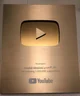 Gold play button